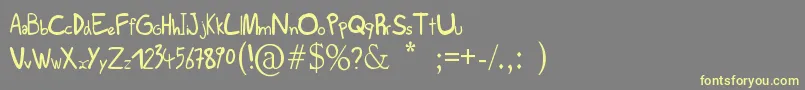 Scribs Font – Yellow Fonts on Gray Background