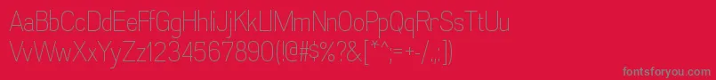 フォントAkazanltRegular – 赤い背景に灰色の文字