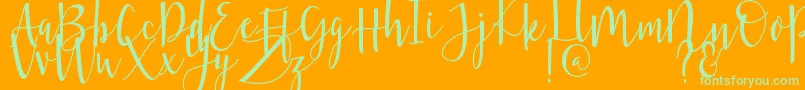 Violette-Schriftart – Grüne Schriften auf orangefarbenem Hintergrund