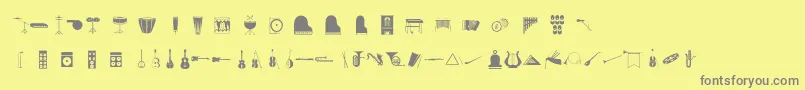 Musico-fontti – harmaat kirjasimet keltaisella taustalla