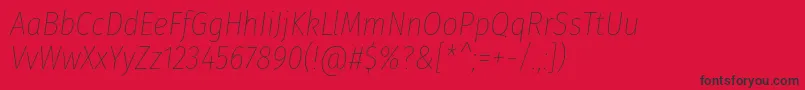 Czcionka FirasanscondensedThinitalic – czarne czcionki na czerwonym tle