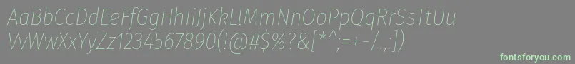 Czcionka FirasanscondensedThinitalic – zielone czcionki na szarym tle