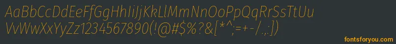 Czcionka FirasanscondensedThinitalic – pomarańczowe czcionki na czarnym tle