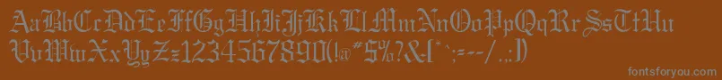 フォントGregorianflf – 茶色の背景に灰色の文字