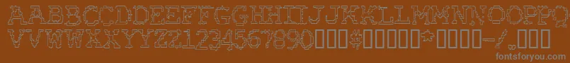 RubberBiscuitBevelOutline Font – Gray Fonts on Brown Background