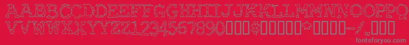 En savoir plus sur la police RubberBiscuitBevelOutline Police RubberBiscuitBevelOutline – polices grises sur fond rouge