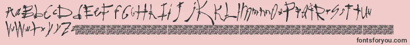 フォントSurereal – ピンクの背景に黒い文字
