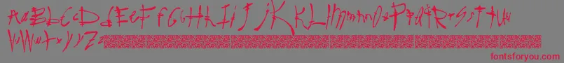 フォントSurereal – 赤い文字の灰色の背景
