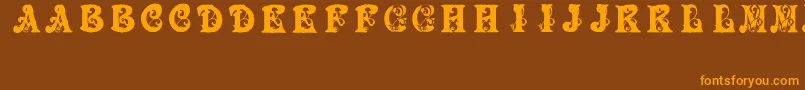 BabyPirate-Schriftart – Orangefarbene Schriften auf braunem Hintergrund