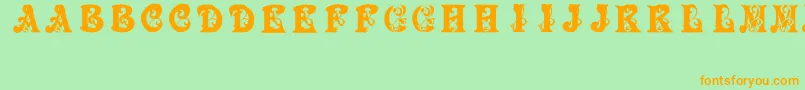 BabyPirate-Schriftart – Orangefarbene Schriften auf grünem Hintergrund