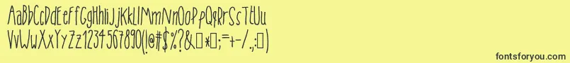 Tanaestelskinnyhandmade01Regular Font – Black Fonts on Yellow Background