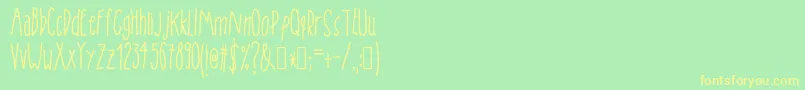 fuente Tanaestelskinnyhandmade01Regular – Fuentes Amarillas Sobre Fondo Verde