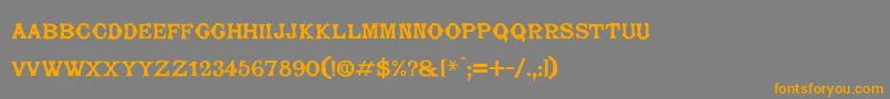 フォントBarjorelle – オレンジの文字は灰色の背景にあります。