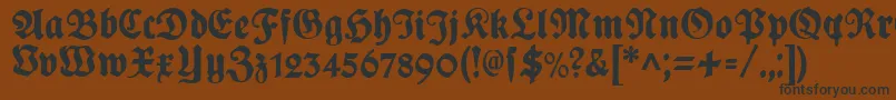 PlakatFraktur Font – Black Fonts on Brown Background