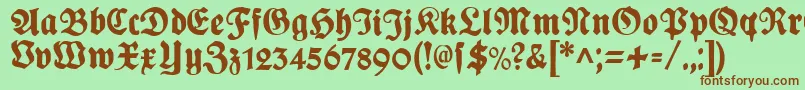 PlakatFraktur Font – Brown Fonts on Green Background