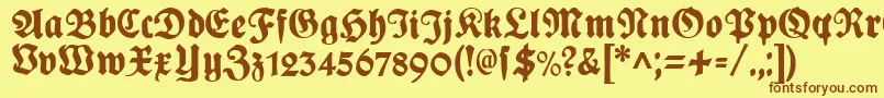 PlakatFraktur Font – Brown Fonts on Yellow Background