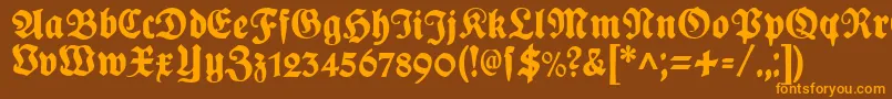 PlakatFraktur Font – Orange Fonts on Brown Background