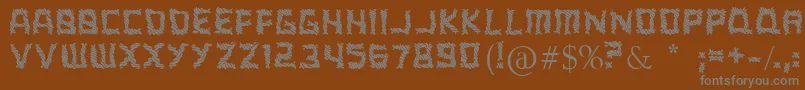 ARippingYarnToo-fontti – harmaat kirjasimet ruskealla taustalla