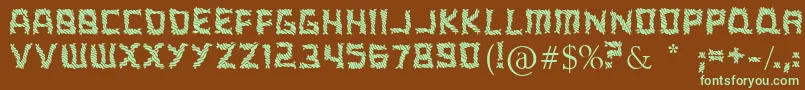 フォントARippingYarnToo – 緑色の文字が茶色の背景にあります。