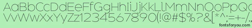 AdequateExtralight Font – Black Fonts on Green Background