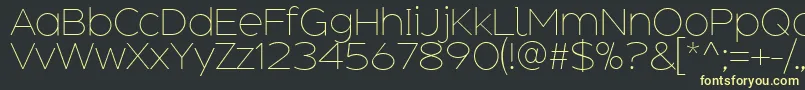 AdequateExtralight Font – Yellow Fonts on Black Background
