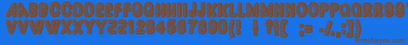 Dazzler Font – Brown Fonts on Blue Background