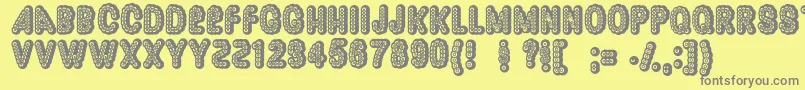 Dazzler Font – Gray Fonts on Yellow Background
