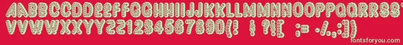 フォントDazzler – 赤い背景に緑の文字