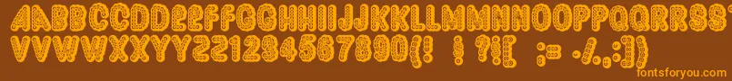 Dazzler Font – Orange Fonts on Brown Background