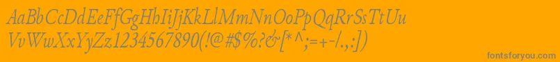 JunicodeItaliccondensed-Schriftart – Graue Schriften auf orangefarbenem Hintergrund