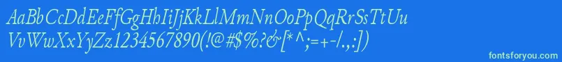 JunicodeItaliccondensed Font – Green Fonts on Blue Background