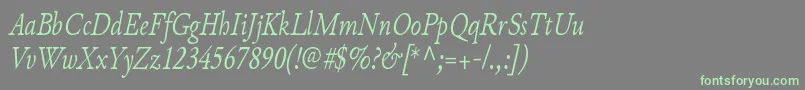 JunicodeItaliccondensed Font – Green Fonts on Gray Background