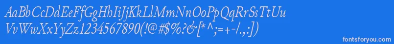 JunicodeItaliccondensed Font – Pink Fonts on Blue Background