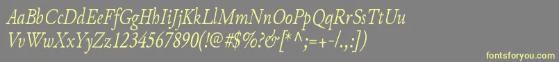 JunicodeItaliccondensed Font – Yellow Fonts on Gray Background