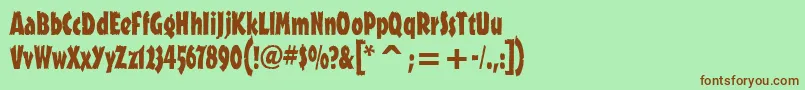 OutbackitcTt-fontti – ruskeat fontit vihreällä taustalla