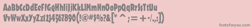 OutbackitcTt-Schriftart – Graue Schriften auf rosa Hintergrund