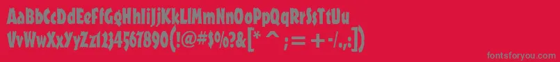 フォントOutbackitcTt – 赤い背景に灰色の文字