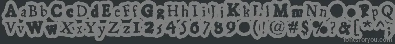 フォントGassygaut – 黒い背景に灰色の文字