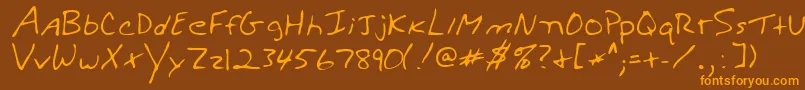 フォントWalterRegular – オレンジ色の文字が茶色の背景にあります。