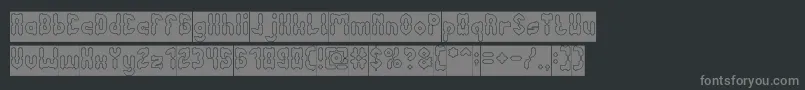 AntiqueRetroHollowInverse-fontti – harmaat kirjasimet mustalla taustalla