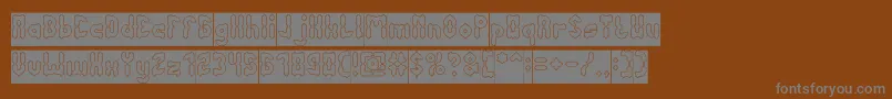 Weitere Informationen zur AntiqueRetroHollowInverse-Schriftart AntiqueRetroHollowInverse-Schriftart – Graue Schriften auf braunem Hintergrund