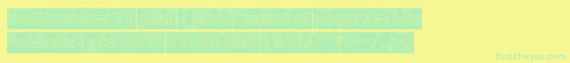 AntiqueRetroHollowInverse Font – Green Fonts on Yellow Background