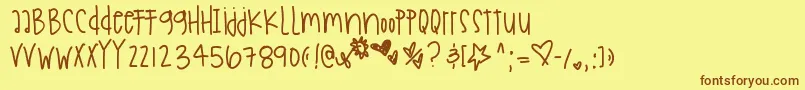 Holidaysarecoming Font – Brown Fonts on Yellow Background
