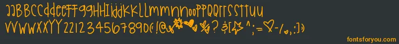 Holidaysarecoming-Schriftart – Orangefarbene Schriften auf schwarzem Hintergrund