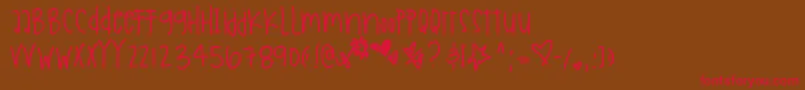 Holidaysarecoming Font – Red Fonts on Brown Background