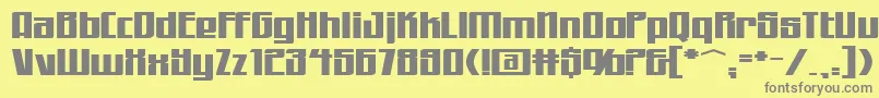 フォントWorkingmanExtended – 黄色の背景に灰色の文字