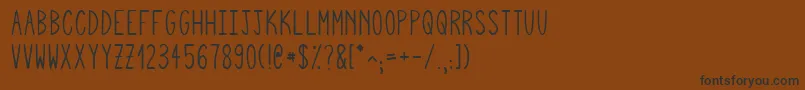 Police Squigglyasta – polices noires sur fond brun