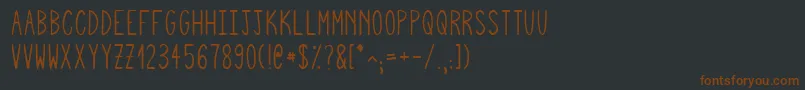 Шрифт Squigglyasta – коричневые шрифты на чёрном фоне