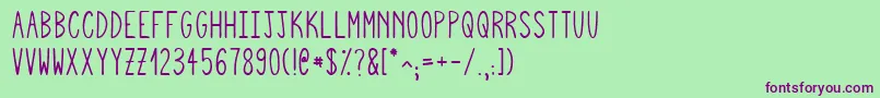 Czcionka Squigglyasta – fioletowe czcionki na zielonym tle