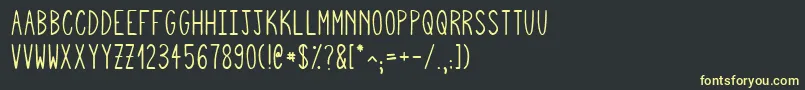 フォントSquigglyasta – 黒い背景に黄色の文字